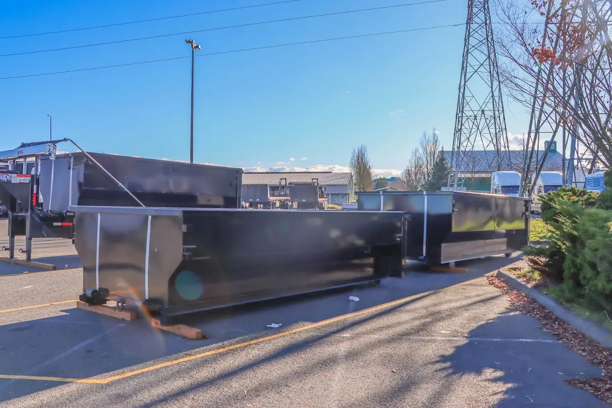 Roll-off dumpster ready for waste disposal at job site for Yard Waste Dumpster Rental in Loughman
